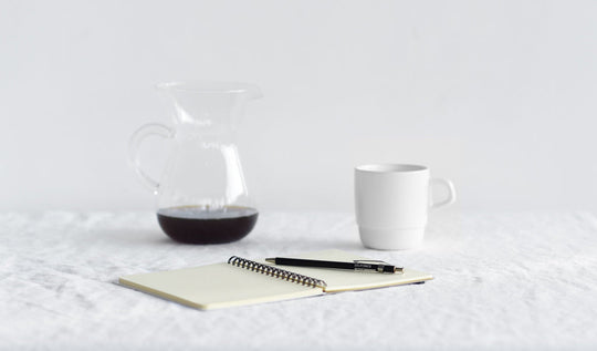 notebook and coffee mug