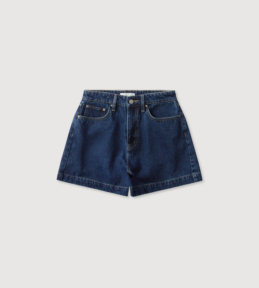 Blue denim shorts on a light gray background
