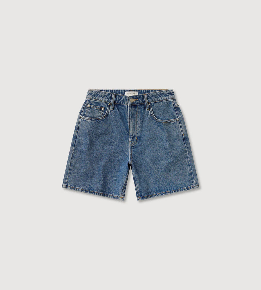 Blue denim shorts on a light gray background