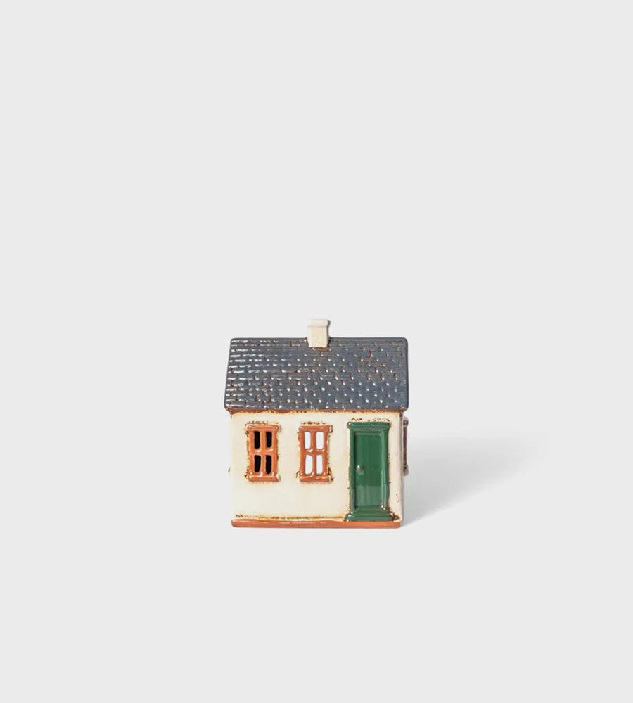 Small model of a house on a white background