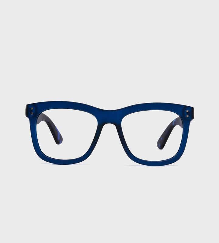 Blue eyeglasses on a light gray background