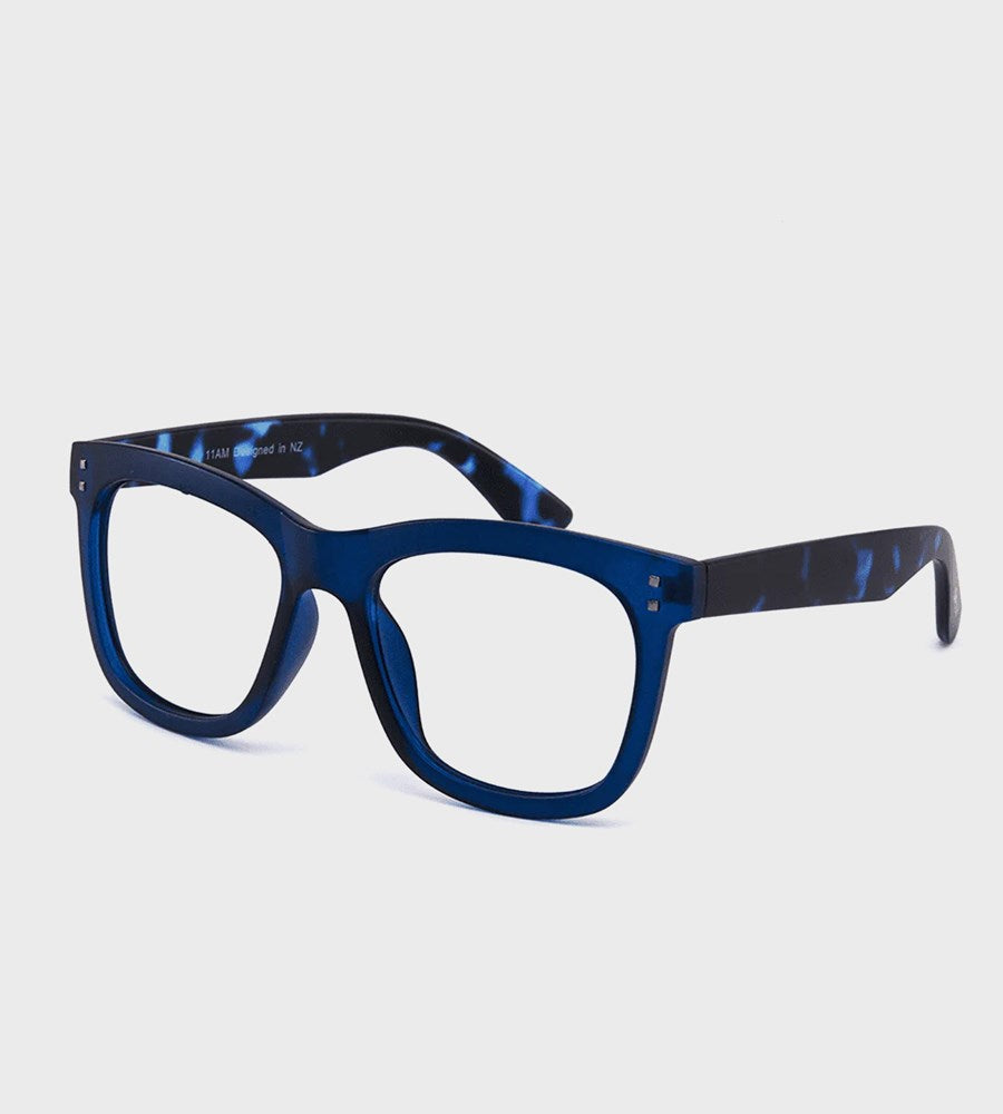 Blue eyeglasses on a light gray background