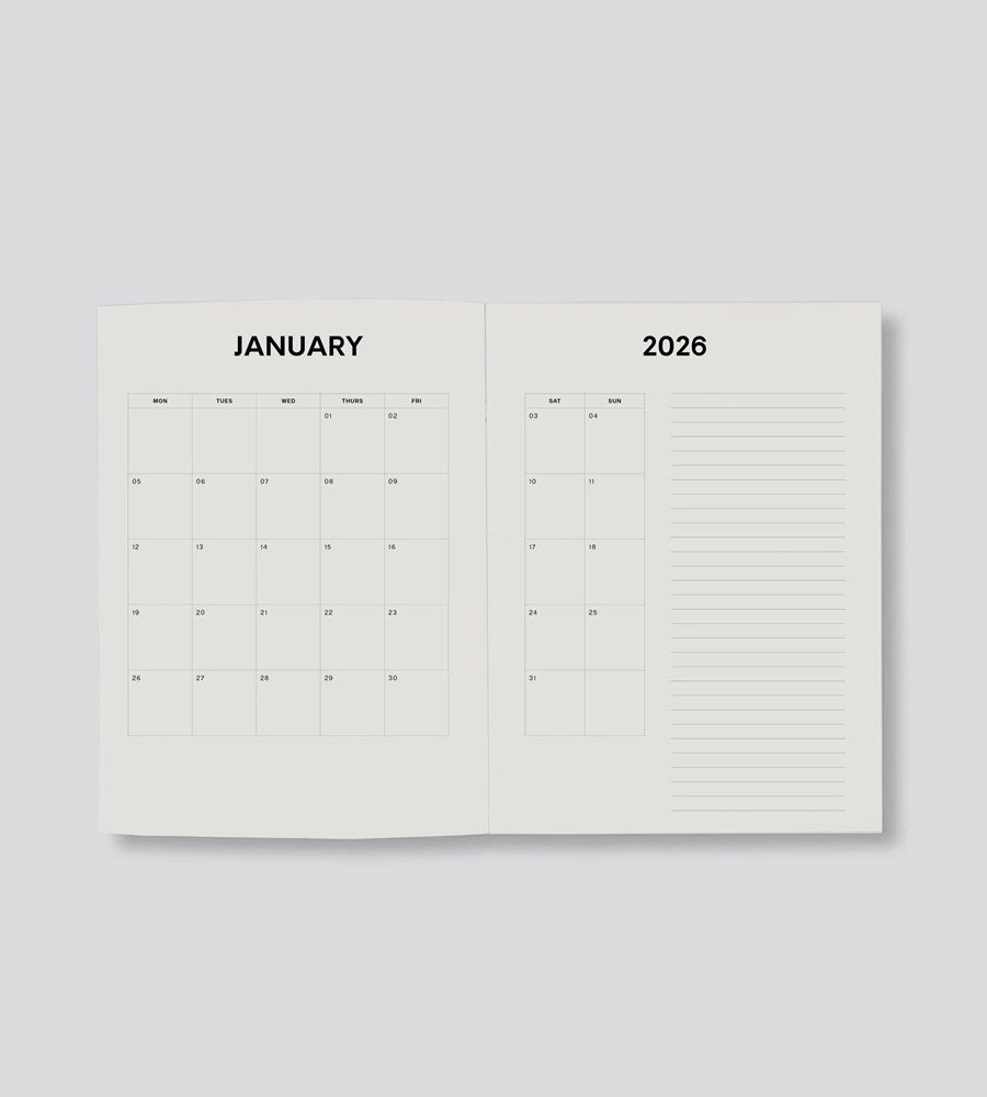 Open planner showing January 2026 on a light gray background