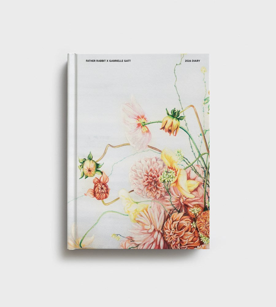 Book with floral design on a white background