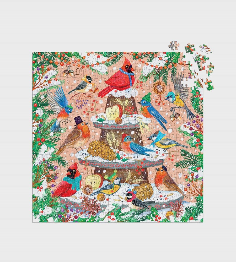 Jigsaw puzzle with a festive design of birds and winter elements on a white background
