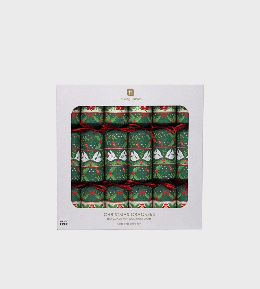 Packaged Christmas crackers with festive designs on a white background