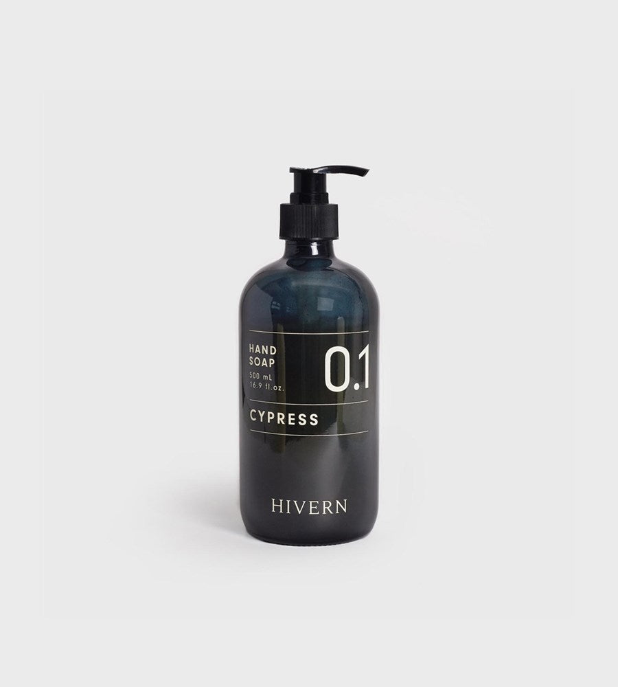 Black hand soap bottle with pump labeled 'Cypress' by 'Hivern' on a light gray background