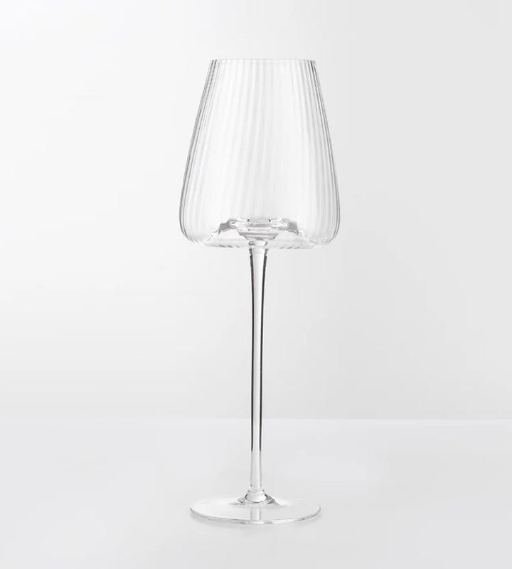 Clear glass wine glass on a white background