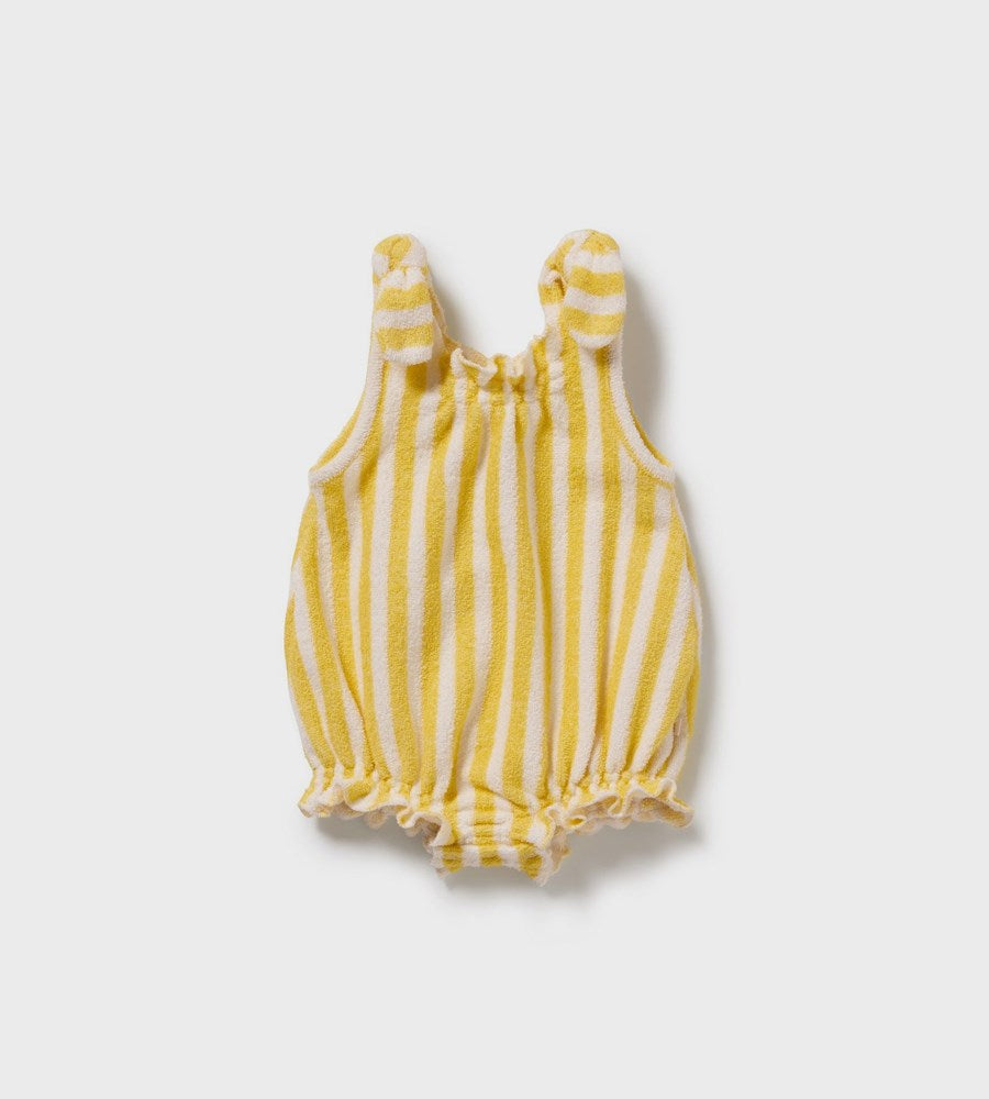 Yellow and white striped baby romper on a light gray background