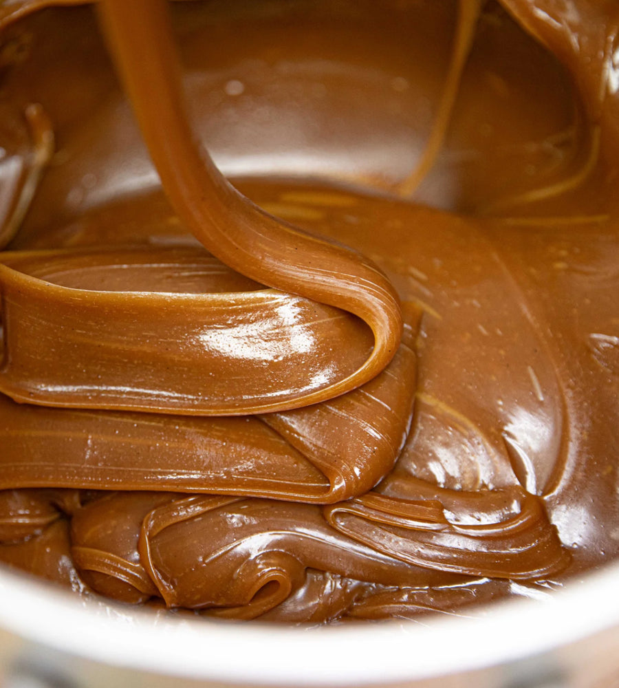 Close-up of glossy brown chocolate spread