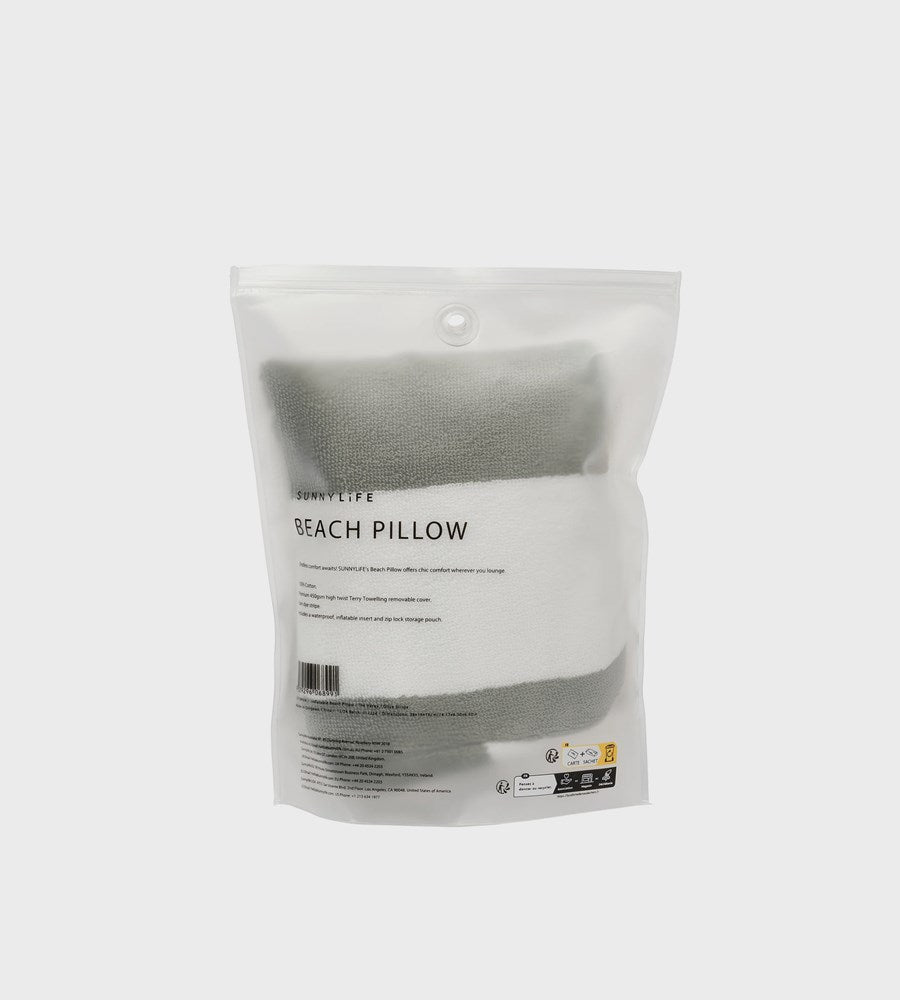 Packaged beach pillow with 'Pomelo Life' branding on a white background