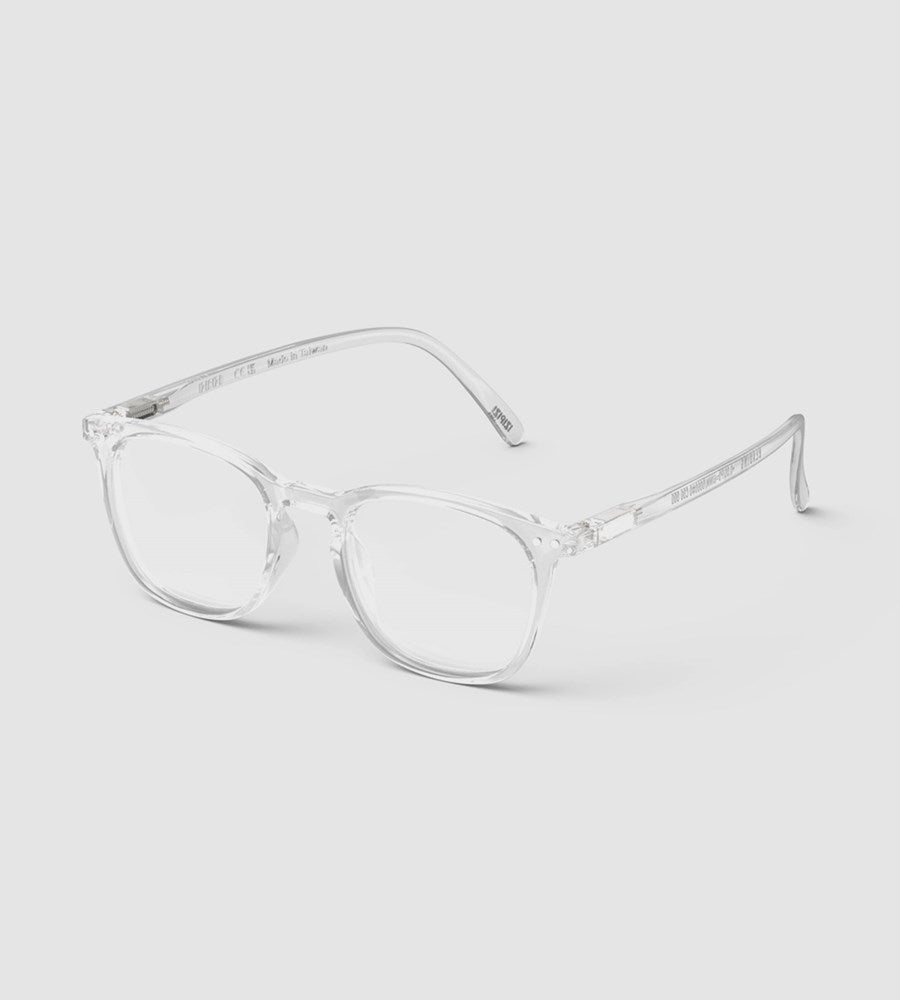 Clear eyeglasses on a light gray background