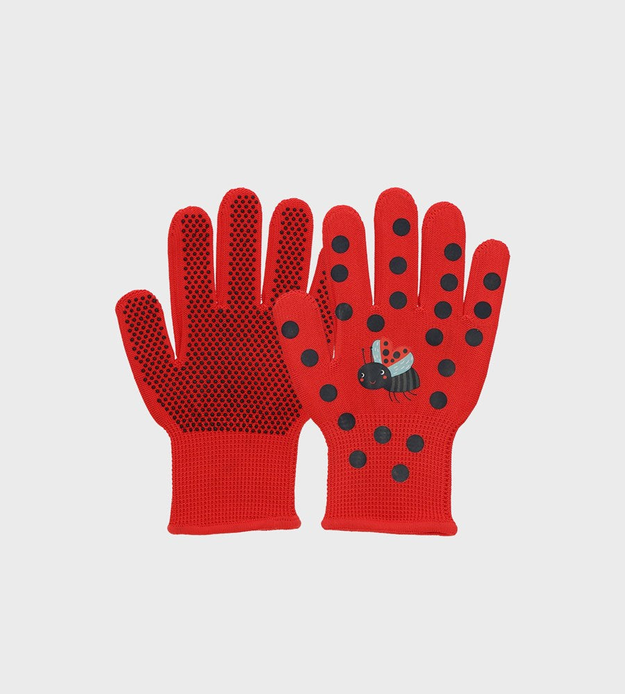 Red gloves with black polka dots and a ladybug design on a light gray background
