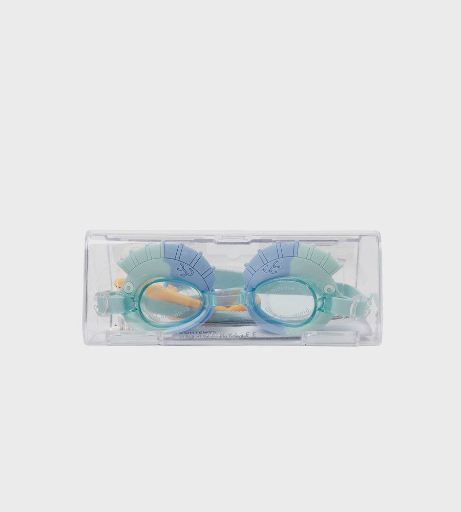 Children's dragon-themed goggles in a clear plastic case on a white background