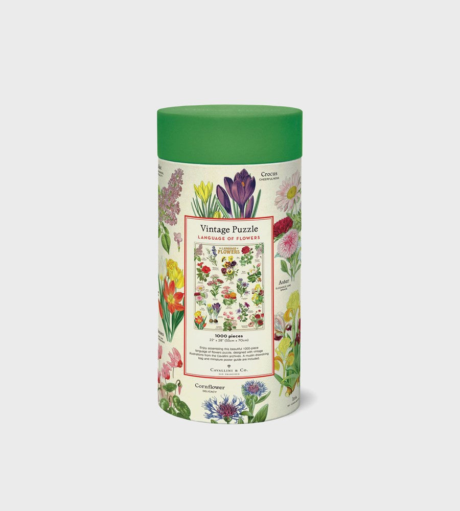  cylindrical puzzle box with floral design on a white background