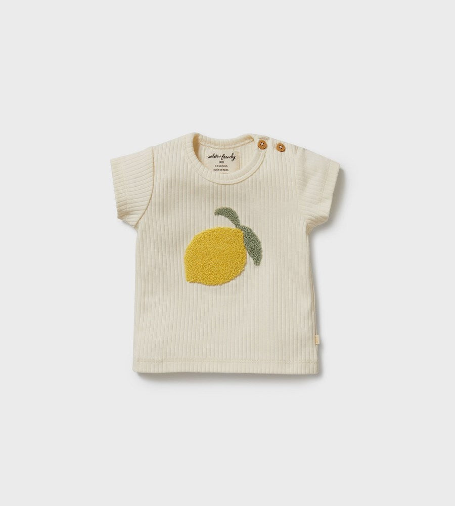 Baby t-shirt with lemon design on a white background