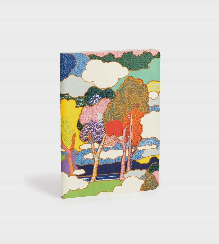 Colorful notebook with artistic design on a white background