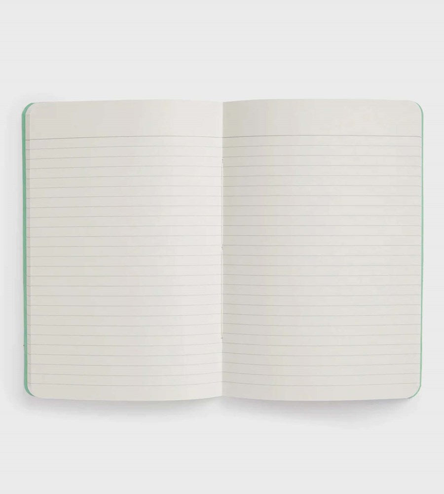 Open notebook with lined pages on a white background