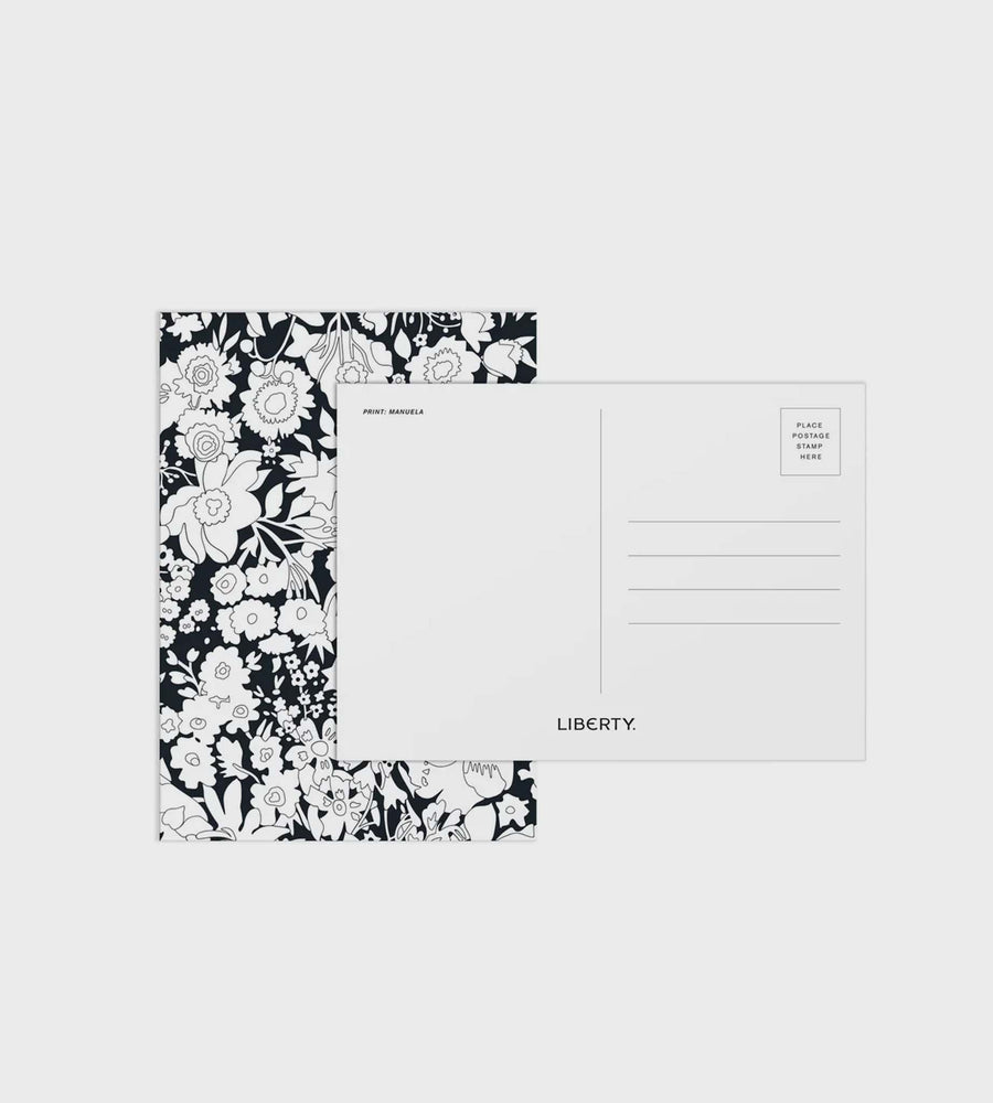 Floral patterned card and plain card with 'Liberty' branding on a white background