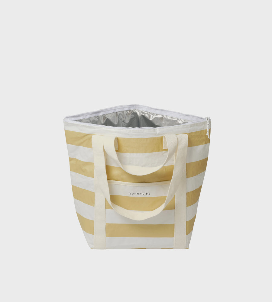 Yellow and white striped cooler bag with a silver interior on a light gray background