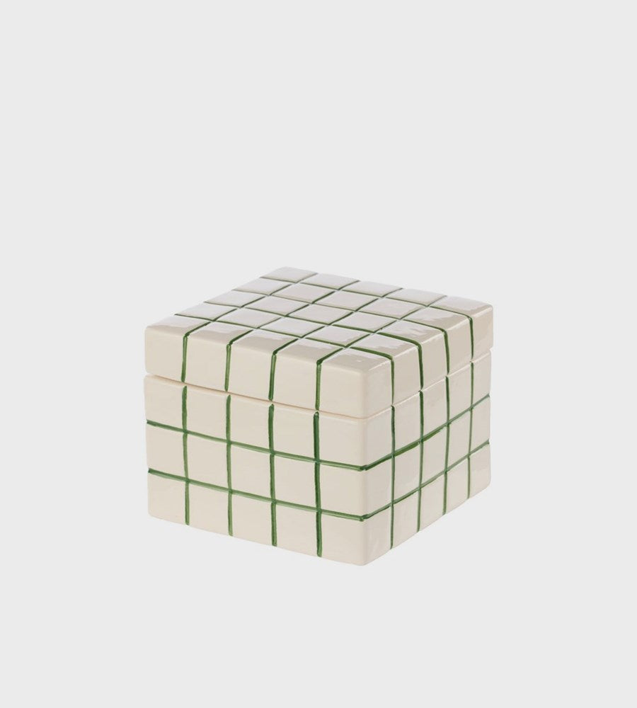 Square box with green grid pattern on a white background