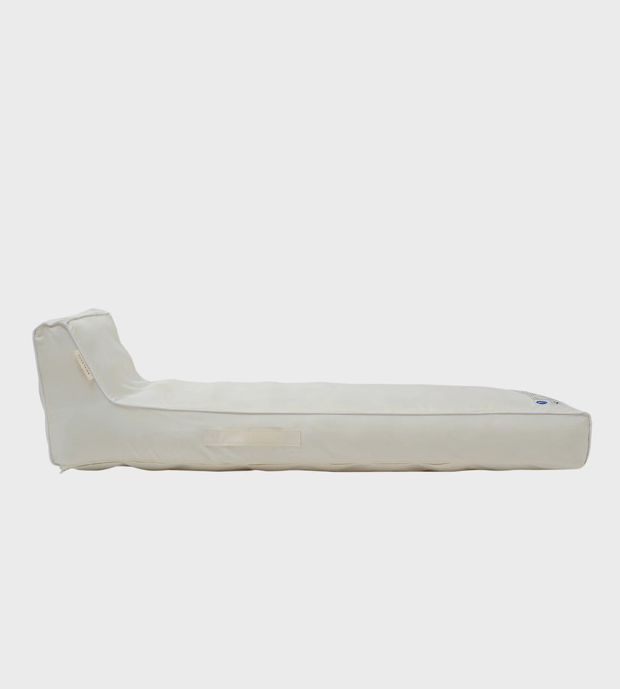 White outdoor lounge chair on a white background