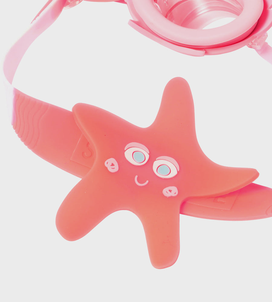Pink starfish-shaped water bottle with a face on a white background