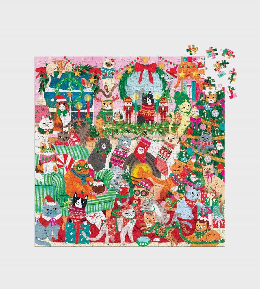 Jigsaw puzzle with festive cat-themed design on a white background