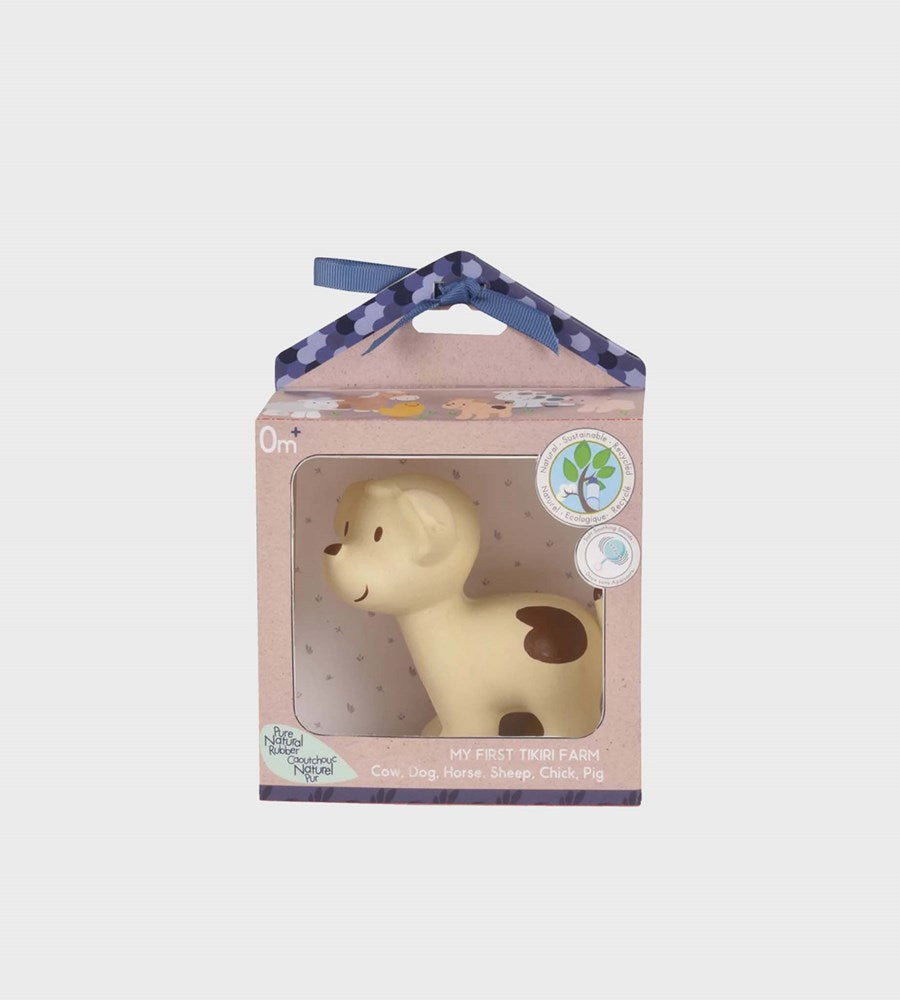Dog-shaped toy in packaging with a visible brand logo on a light gray background