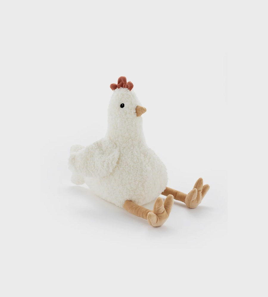 Plush toy chicken on a white background