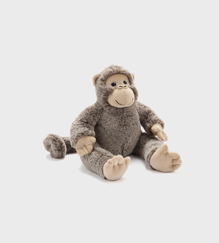 Plush monkey toy on a light gray background