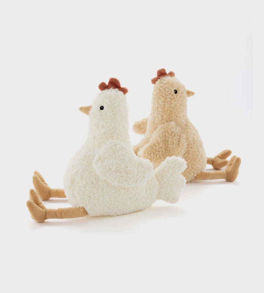 Two plush chicken toys on a white background