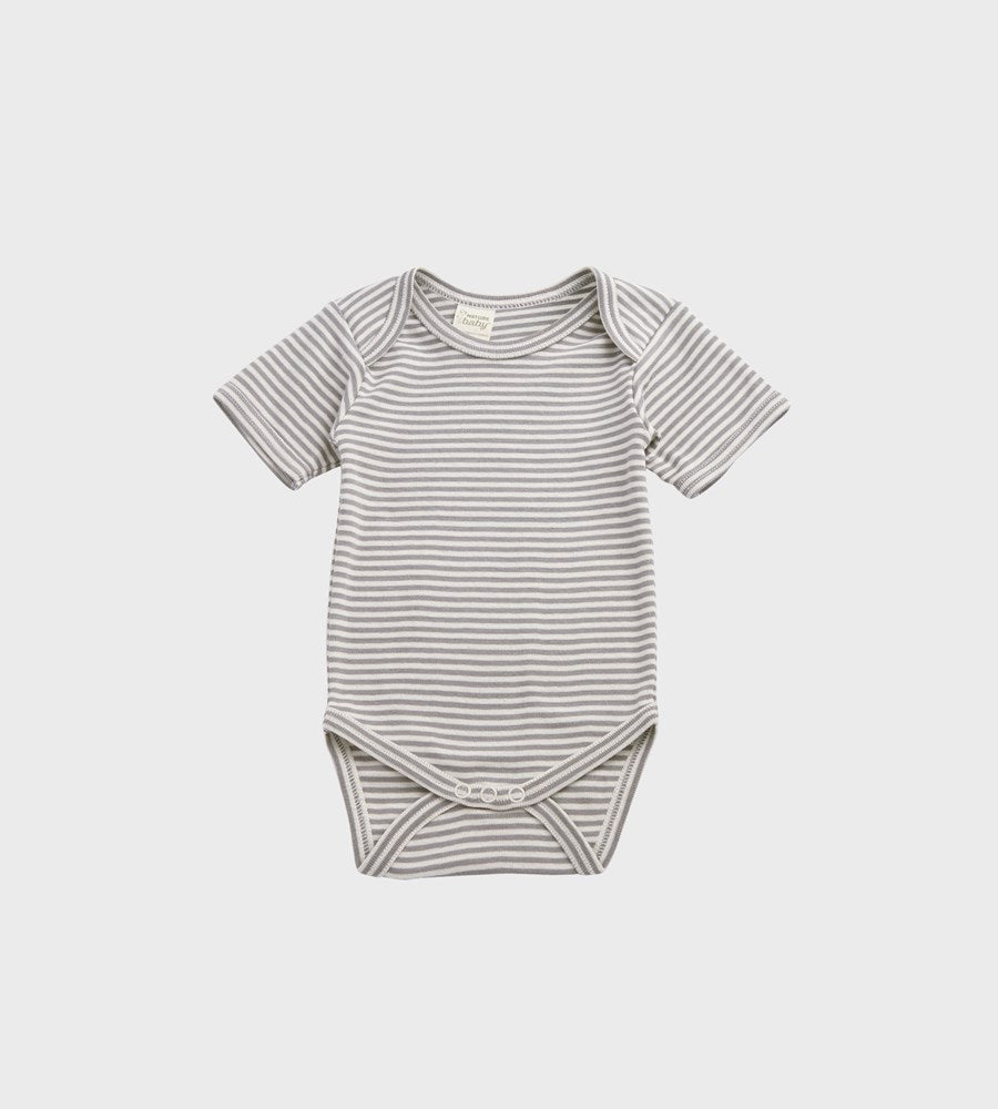 Striped baby bodysuit on a light gray background
