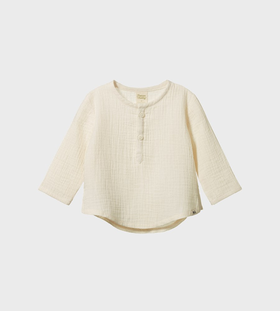 Beige long-sleeve shirt on a white background