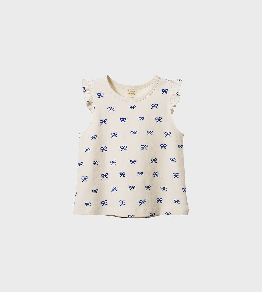 White tank top with blue bow pattern on a white background