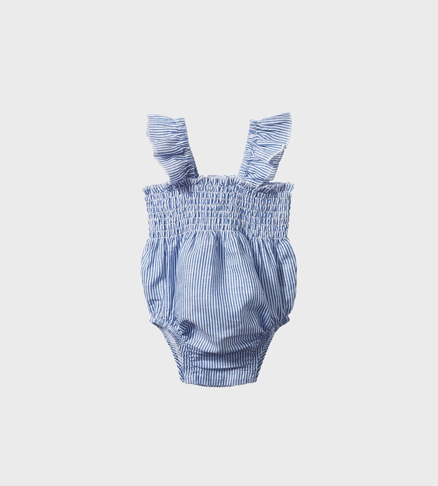 Blue striped baby romper with ruffled straps on a light gray background