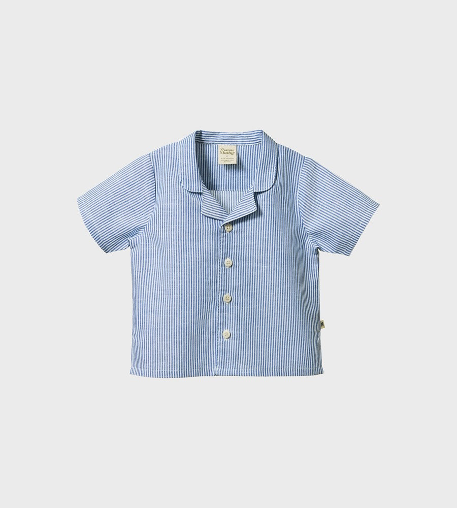 Blue striped shirt on a light gray background