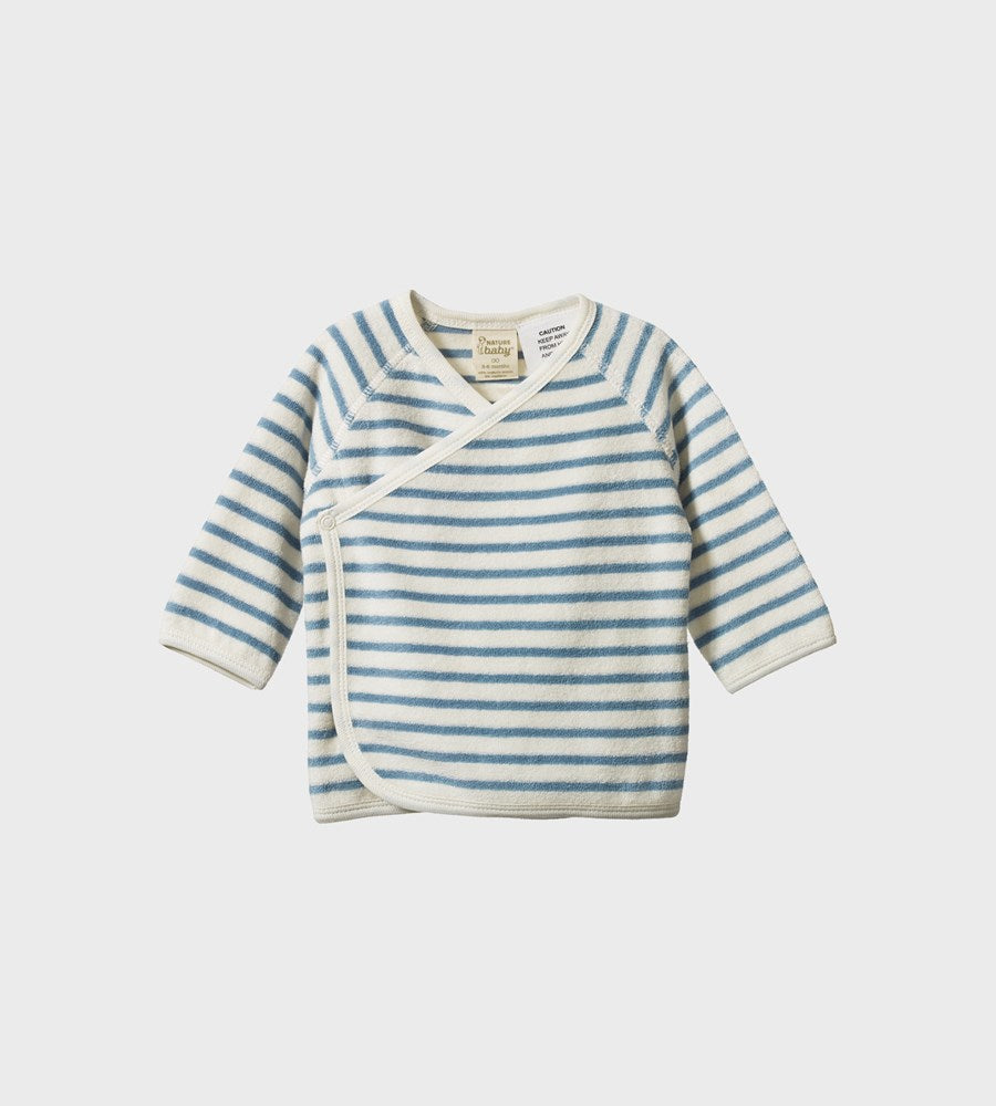 Striped baby wrap with blue and white pattern on a light gray background