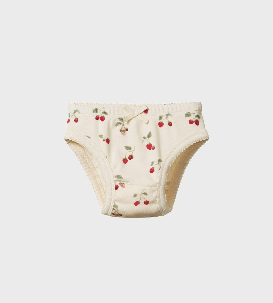 Beige children's underwear with cherry pattern on a light gray background