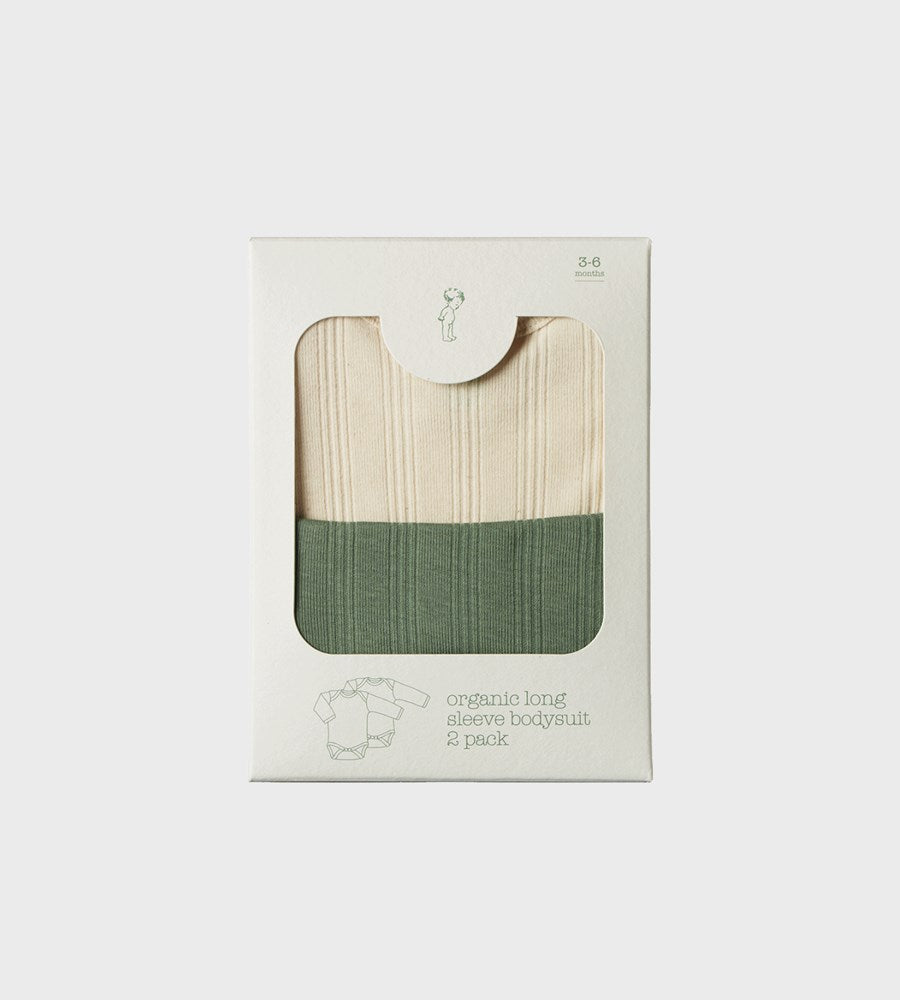 Packaged organic baby clothing with green and beige design on a white background