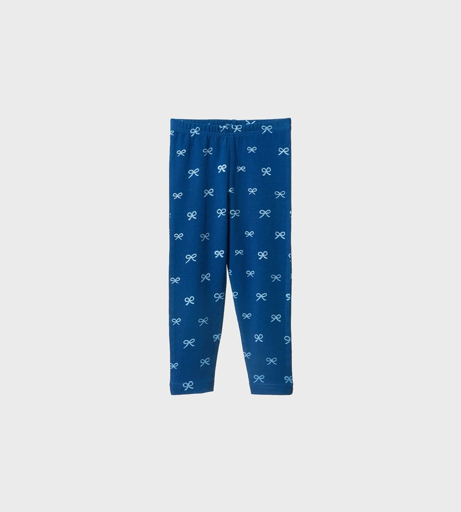 Blue leggings with bow pattern on a light gray background