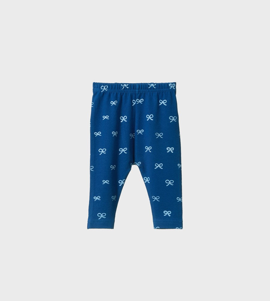 Blue leggings with bow pattern on a white background