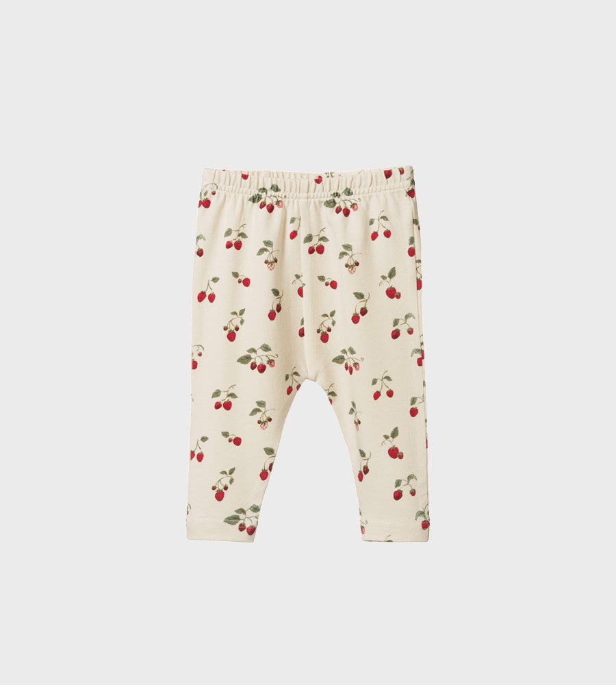 Baby leggings with cherry pattern on a white background