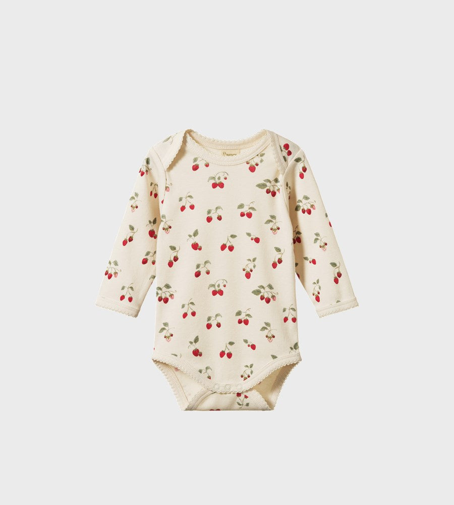 Baby onesie with cherry pattern on a white background