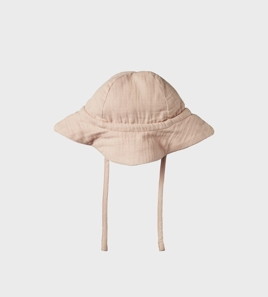 Beige bucket hat on a light gray background