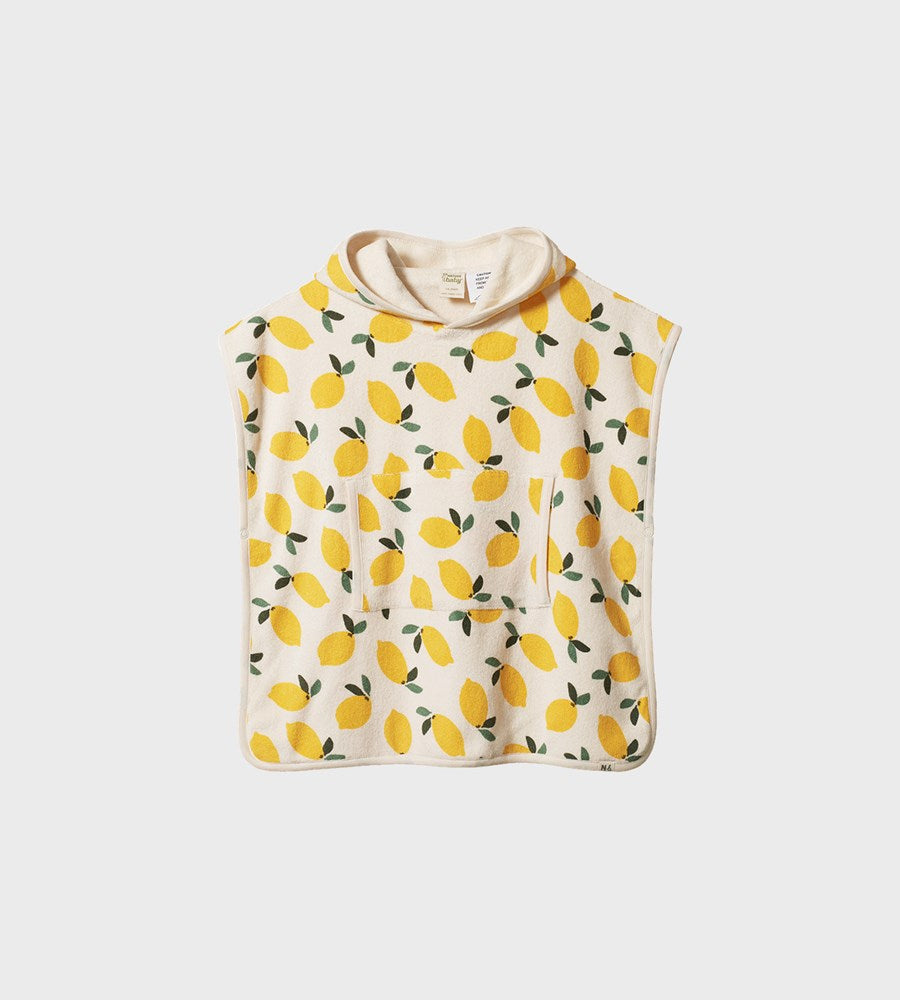 Children's poncho with lemon pattern on a white background