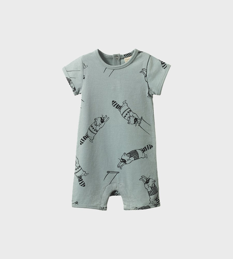 Light blue baby romper with black animal print on a white background