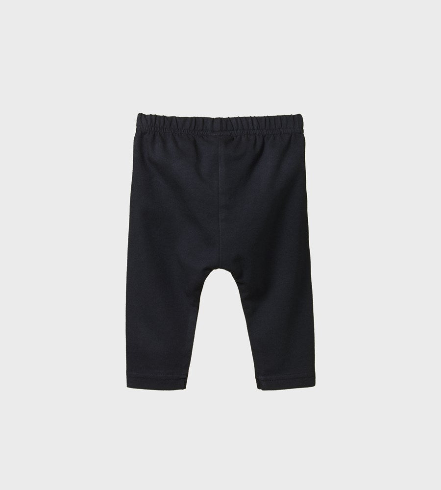 Black baby leggings on a light gray background
