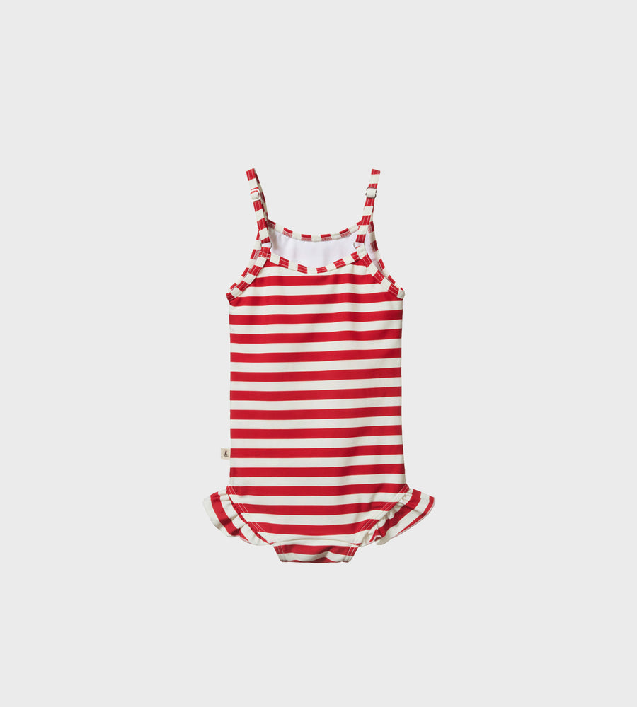 Red and white striped swimsuit on a light gray background