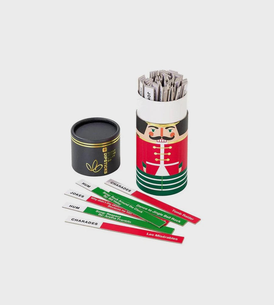 Decorative canister with game cards and labels on a white background